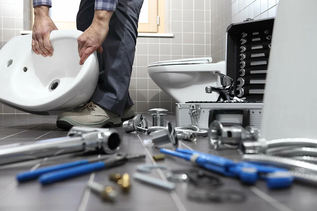 Plumbing tools prepared for a bathroom repair in Miami Beach