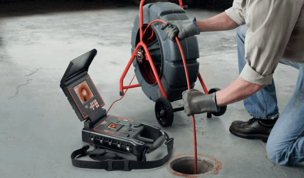 Technician performing a sewer camera inspection in Miami Beach
